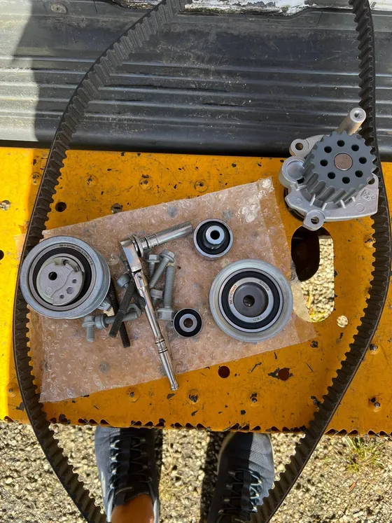New cambelt and water pump kit laid out ready for fitting