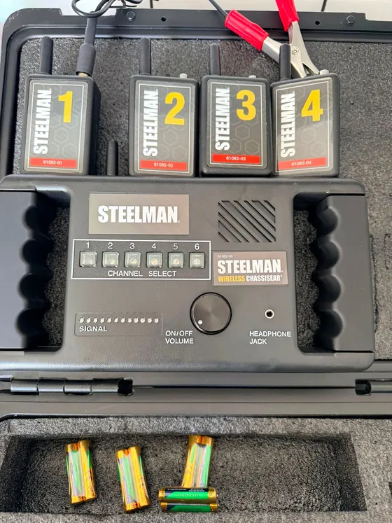 Wireless chassis-ear kit used to trace knocks and noises on a road test