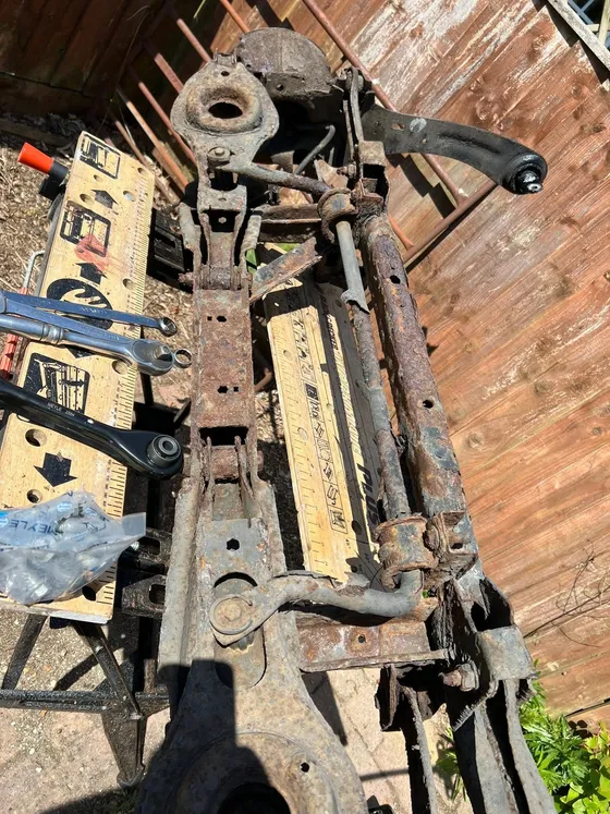 Rotted chassis rail uncovered during a vehicle inspection