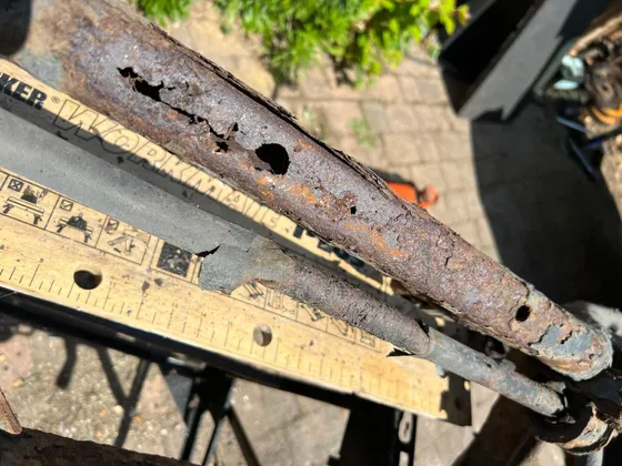 Corroded leaf spring found during a vehicle inspection